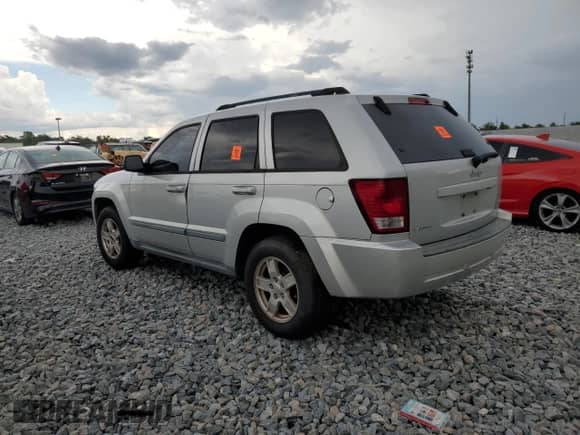2007 Jeep Grand Cherokee Laredo z VIN 1J8GS48K67C517746, wystawiony jako Copart lot #80310525 z przebiegiem 211 900 mil mil oraz Nie do naprawy • Non repairable. Historia ofert i sprzedaży dostępna na DreamBid. Obrazek 2.