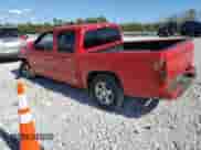 2011 Chevrolet Colorado 1LT with VIN 1GCDSCFE5B8106447, listed as a Copart auction lot 82274615 with 143,515 mi miles and Salvage title. Bid and sale history available at DreamBid. Image 2.