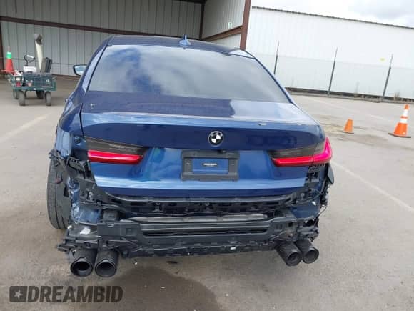 2021 BMW 3 Series 330i с VIN 3MW5R1J09M8B86677, выставлен на аукционе IAAI как лот 43432487 с пробегом 74 515 миль миль и . История ставок и продаж доступна на DreamBid. Изображение 18.