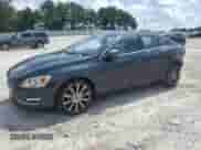 2015 Volvo S60 T6 Drive-E with VIN YV149MFK3F1349819, listed as a Copart auction lot 66590114 with 166,860 mi miles and Salvage title. Bid and sale history available at DreamBid. Image 1.
