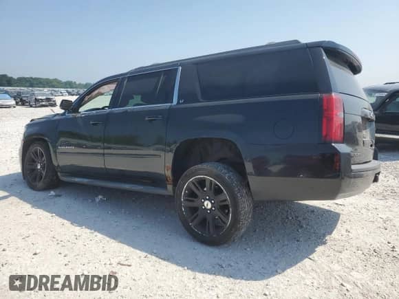 2015 Chevrolet Suburban LT с VIN 1GNSKJKC1FR282791, выставлен на аукционе Copart как лот 66614295 с пробегом 159 538 миль миль и Чистый • Clean title. История ставок и продаж доступна на DreamBid. Изображение 2.