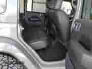 2023 Jeep Wrangler Sahara Altitude with VIN 1C4HJXEG0PW558839, listed as a IAAI auction lot 43001327 with 16,845 mi miles and . Bid and sale history available at DreamBid. Image 8.