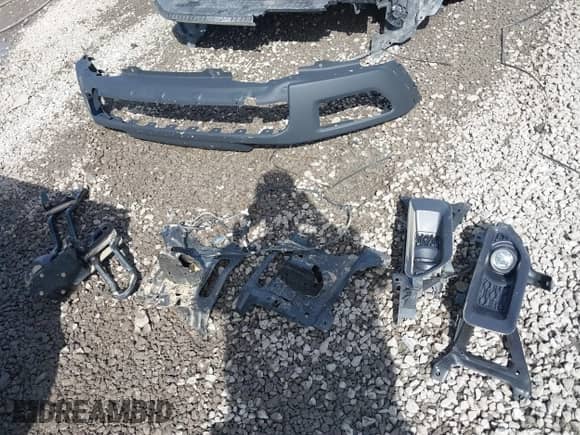 2018 Ram 1500 Rebel with VIN 1C6RR7YT4JS145768, listed as a IAAI auction lot 41593734 with 66,820 mi miles and . Bid and sale history available at DreamBid. Image 12.