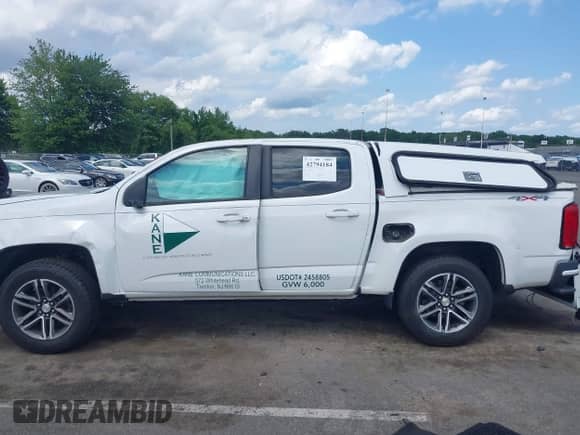 2021 Chevrolet Colorado 4WD Work Truck с VIN 1GCGTBEN1M1156893, выставлен на аукционе IAAI как лот 42794184 с пробегом 64 860 миль миль и . История ставок и продаж доступна на DreamBid. Изображение 13.