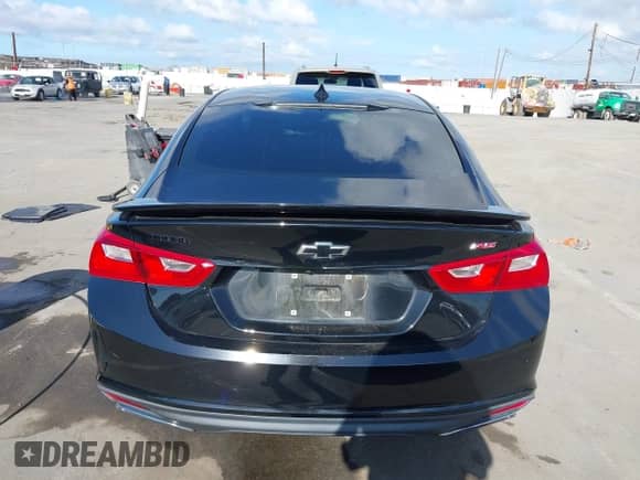 2020 Chevrolet Malibu RS with VIN 1G1ZG5STXLF135018, listed as a IAAI auction lot 43195958 with 94,145 mi miles and . Bid and sale history available at DreamBid. Image 16.