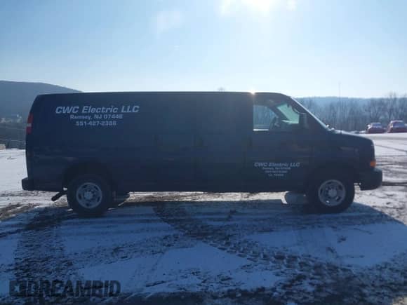 2014 Chevrolet Express Cargo with VIN 1GCWGGBA5E1205786, listed as a IAAI auction lot 41339085 with 201,460 mi miles and . Bid and sale history available at DreamBid. Image 13.