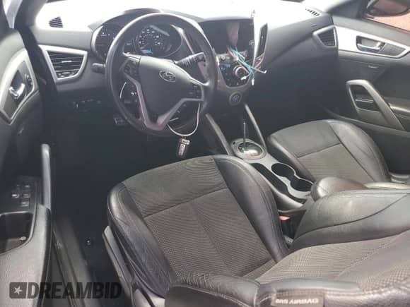 2014 Hyundai Veloster z VIN KMHTC6AD4EU194875, wystawiony jako Copart lot #84427235 z przebiegiem 127 813 mil mil oraz Szkoda całkowita • Salvage title. Historia ofert i sprzedaży dostępna na DreamBid. Obrazek 8.