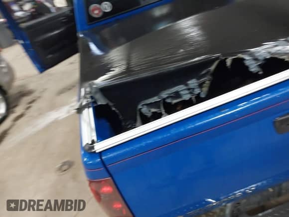 2007 Chevrolet Colorado 2LT z VIN 1GCDT13E478177703, wystawiony jako IAAI lot #43571198 z przebiegiem Nie podano mil oraz . Historia ofert i sprzedaży dostępna na DreamBid. Obrazek 6.