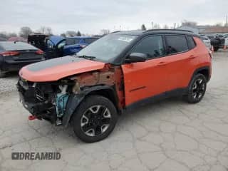 2018 Jeep Compass Trailhawk with VIN 3C4NJDDB0JT134369, listed as a Copart auction lot 83808784 with 113,777 mi miles and Salvage title. Bid and sale history available at DreamBid. Image 1.