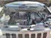 2010 Jeep Compass Sport z VIN 1J4NT1FB8AD671108, wystawiony jako Copart lot #82151454 z przebiegiem 206 413 mil mil oraz Szkoda całkowita • Salvage title. Historia ofert i sprzedaży dostępna na DreamBid. Obrazek 12.