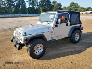 2004 Jeep Wrangler X z VIN 1J4FA39S44P749596, wystawiony jako Copart lot #84732995 z przebiegiem 142 238 mil mil oraz Szkoda całkowita • Salvage title. Historia ofert i sprzedaży dostępna na DreamBid. Obrazek 1.