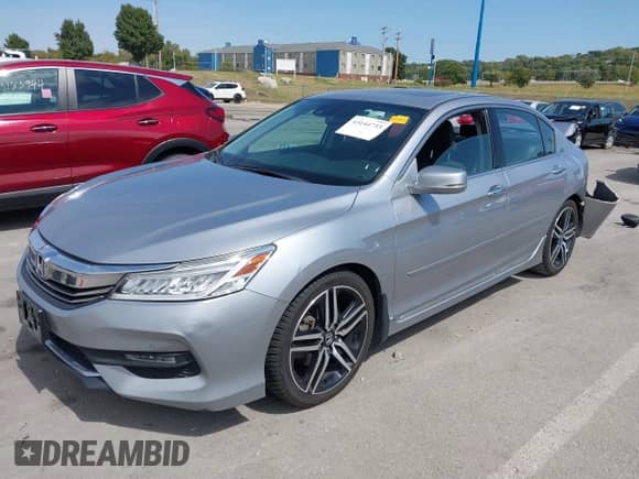 2016 Honda Accord Touring with VIN 1HGCR3F97GA031715, listed as a IAAI auction lot 43144733 with Not provided miles and . Bid and sale history available at DreamBid. Image 2.
