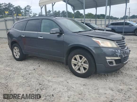 2014 Chevrolet Traverse LT с VIN 1GNKRHKD2EJ312603, выставлен на аукционе Copart как лот 59562055 с пробегом 188 595 миль миль и На запчасти • Non repairable. История ставок и продаж доступна на DreamBid. Изображение 4.