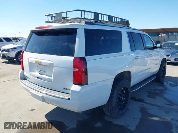 2017 Chevrolet Suburban Premier z VIN 1GNSCJKC2HR302434, wystawiony jako IAAI lot #41696536 z przebiegiem 126 118 mil mil oraz . Historia ofert i sprzedaży dostępna na DreamBid. Obrazek 4.