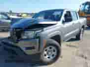 2022 Nissan Frontier S with VIN 1N6ED1EJ3NN633584, listed as a IAAI auction lot 43409367 with 99,897 mi miles and . Bid and sale history available at DreamBid. Image 2.