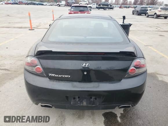 2008 Hyundai Tiburon GS with VIN KMHHM66D78U291813, listed as a Copart auction lot 82189404 with 103,272 mi miles and Clean title. Bid and sale history available at DreamBid. Image 6.