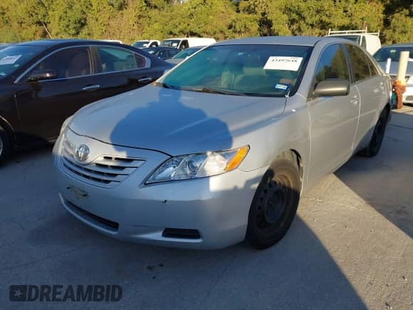 2009 Toyota Camry LE with VIN 4T1BE46K39U318352, listed as a IAAI auction lot 43497648 with 121,154 mi miles and . Bid and sale history available at DreamBid. Image 2.