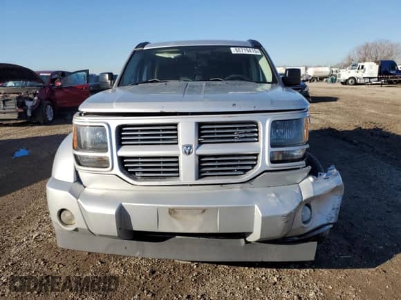 2010 Dodge Nitro SXT with VIN 1D4PT5GK5AW106990, listed as a Copart auction lot 88719415 with 193,019 mi miles and Salvage title. Bid and sale history available at DreamBid. Image 5.