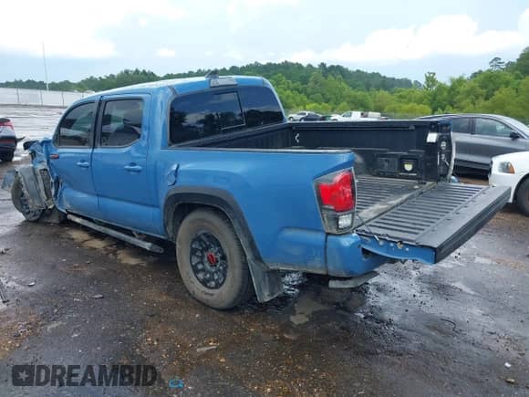 2018 Toyota Tacoma SR with VIN 5TFCZ5AN6JX162962, listed as a IAAI auction lot 42811440 with 74,189 mi miles and . Bid and sale history available at DreamBid. Image 3.