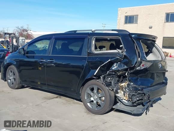 2015 Toyota Sienna SE with VIN 5TDXK3DC4FS583841, listed as a IAAI auction lot 41223820 with 190,117 mi miles and . Bid and sale history available at DreamBid. Image 3.