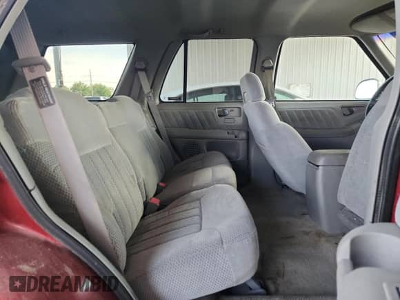 1996 Chevrolet Blazer z VIN 1GNDT13W8T2264162, wystawiony jako Copart lot #62783675 z przebiegiem 91 835 mil mil oraz Szkoda całkowita • Salvage title. Historia ofert i sprzedaży dostępna na DreamBid. Obrazek 11.