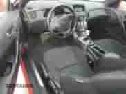 2013 Hyundai Genesis Coupe 2.0T с VIN KMHHT6KDXDU112487, выставлен на аукционе Copart как лот 84668714 с пробегом 88 909 миль миль и Чистый • Clean title. История ставок и продаж доступна на DreamBid. Изображение 8.