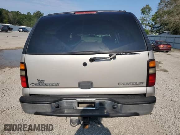 2005 Chevrolet Suburban LS with VIN 3GNEC16Z95G159375, listed as a Copart auction lot 65865884 with 290,671 mi miles and Salvage title. Bid and sale history available at DreamBid. Image 6.