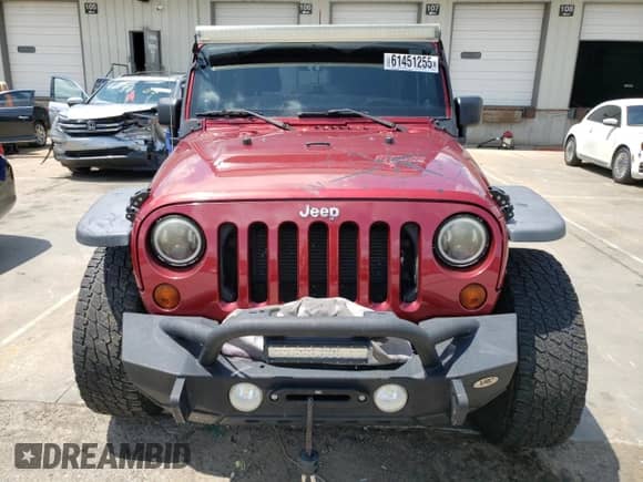 2013 Jeep Wrangler Rubicon 10th Anniversary with VIN 1C4BJWCG6DL508396, listed as a Copart auction lot 61451255 with 125,138 mi miles and Salvage title. Bid and sale history available at DreamBid. Image 5.