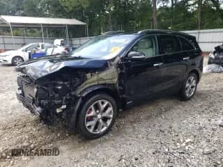 2016 Kia Sorento SX с VIN 5XYPKDA54GG127798, выставлен на аукционе Copart как лот 65968035 с пробегом 61 268 миль миль и Списание • Salvage title. История ставок и продаж доступна на DreamBid. Изображение 1.