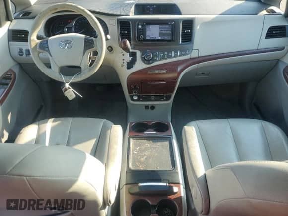 2013 Toyota Sienna XLE with VIN 5TDDK3DC4DS066975, listed as a Copart auction lot 65800415 with 136,892 mi miles and Salvage title. Bid and sale history available at DreamBid. Image 8.