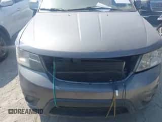 2012 Dodge Journey SXT with VIN 3C4PDCBG8CT220461, listed as a IAAI auction lot 43284185 with 265,254 mi miles and . Bid and sale history available at DreamBid. Image 6.