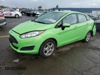 2015 Ford Fiesta SE with VIN 3FADP4BJ6FM171664, listed as a Copart auction lot 82285105 with 128,870 mi miles and Clean title. Bid and sale history available at DreamBid. Image 1.
