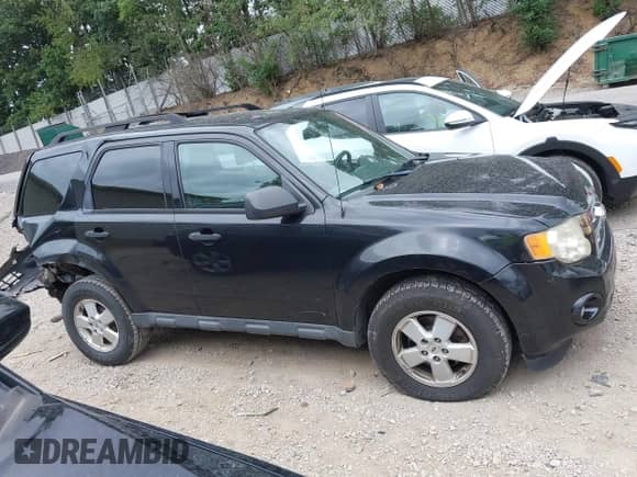 2011 Ford Escape XLT с VIN 1FMCU9D7XBKA48489, выставлен на аукционе IAAI как лот 43001852 с пробегом 156 204 миль миль и . История ставок и продаж доступна на DreamBid. Изображение 13.