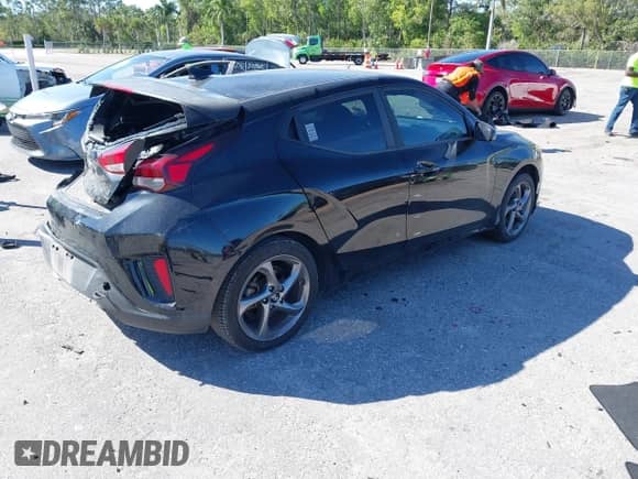 2020 Hyundai Veloster 2.0 with VIN KMHTG6AF6LU023533, listed as a IAAI auction lot 41742430 with 95,531 mi miles and . Bid and sale history available at DreamBid. Image 4.