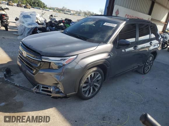 2025 Subaru Forester Touring z VIN JF2SLDTC1SH500073, wystawiony jako Copart lot #84433385 z przebiegiem 4 997 mil mil oraz Szkoda całkowita • Salvage title. Historia ofert i sprzedaży dostępna na DreamBid. Obrazek 1.