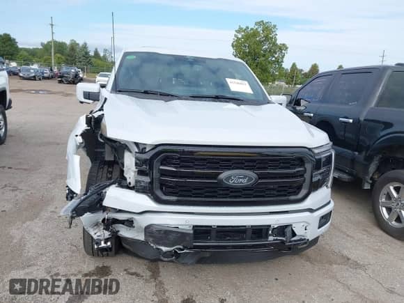 2025 Ford F-150 Lariat with VIN 1FTFW5LD8SFB71812, listed as a IAAI auction lot 43146033 with 1,904 mi miles and . Bid and sale history available at DreamBid. Image 12.