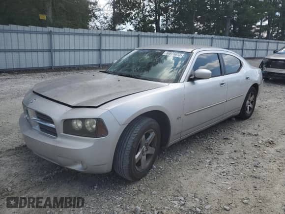 2010 Dodge Charger SXT с VIN 2B3CA3CV2AH271126, выставлен на аукционе Copart как лот 66875073 с пробегом 221 933 миль миль и Списание • Salvage title. История ставок и продаж доступна на DreamBid. Изображение 1.