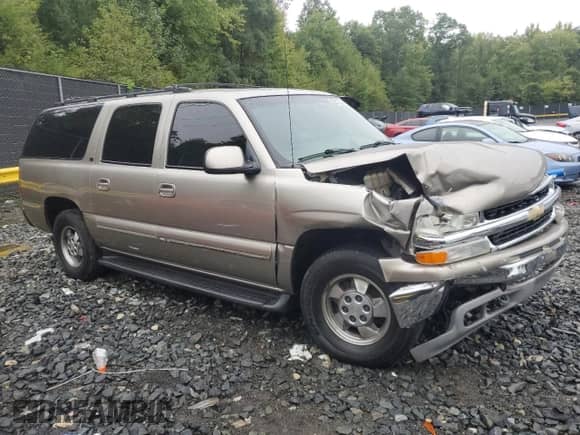 2001 Chevrolet Suburban LS with VIN 3GNEC16T91G165893, listed as a Copart auction lot 72577224 with 270,842 mi miles and Salvage title. Bid and sale history available at DreamBid. Image 4.