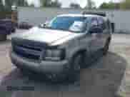2007 Chevrolet Tahoe LS with VIN 1GNFC13C07R272851, listed as a IAAI auction lot 43310420 with 308,519 mi miles and . Bid and sale history available at DreamBid. Image 2.