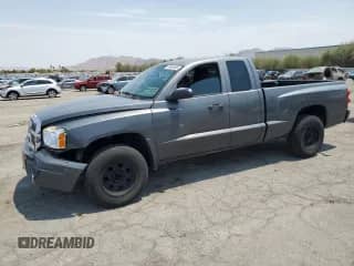 2007 Dodge Dakota SLT with VIN 1D7HE42K27S255960, listed as a Copart auction lot 64684855 with 170,299 mi miles and Salvage title. Bid and sale history available at DreamBid. Image 1.