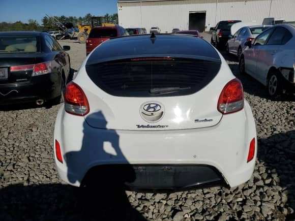 2012 Hyundai Veloster w/Gray Int z VIN KMHTC6AD3CU021197, wystawiony jako Copart lot #84803605 z przebiegiem 170 338 mil mil oraz Szkoda całkowita • Salvage title. Historia ofert i sprzedaży dostępna na DreamBid. Obrazek 7.