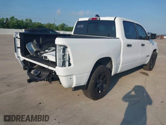 2025 Ram 1500 Tradesman with VIN 1C6RREGGXSN634409, listed as a IAAI auction lot 42945287 with 5,990 mi miles and . Bid and sale history available at DreamBid. Image 4.