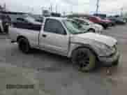 2002 Toyota Tacoma with VIN 5TENL42N82Z080549, listed as a Copart auction lot 80899715 with 115,239 mi miles and Salvage title. Bid and sale history available at DreamBid. Image 4.