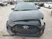 2019 Hyundai Veloster 2.0 z VIN KMHTG6AF8KU006554, wystawiony jako Copart lot #79836623 z przebiegiem 92 283 mil mil oraz . Historia ofert i sprzedaży dostępna na DreamBid. Obrazek 5.