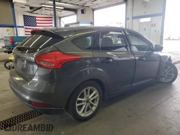 2015 Ford Focus SE с VIN 1FADP3K20FL222516, выставлен на аукционе Copart как лот 80494985 с пробегом 90 085 миль миль и Списание • Salvage title. История ставок и продаж доступна на DreamBid. Изображение 3.