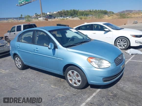 2006 Hyundai Accent GLS z VIN KMHCN46C06U019071, wystawiony jako IAAI lot #42933533 z przebiegiem 111 074 mil mil oraz . Historia ofert i sprzedaży dostępna na DreamBid. Obrazek 1.