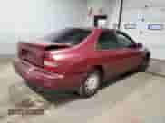 1994 Honda Accord LX с VIN 1HGCD5633RA020090, выставлен на аукционе Copart как лот 85233204 с пробегом 55 909 миль миль и Списание • Salvage title. История ставок и продаж доступна на DreamBid. Изображение 3.