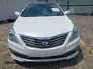 2017 Hyundai Azera Limited z VIN KMHFH4JGXHA588500, wystawiony jako IAAI lot #42888010 z przebiegiem 131 310 mil mil oraz . Historia ofert i sprzedaży dostępna na DreamBid. Obrazek 13.