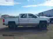 2018 Chevrolet Silverado 1500 LT z VIN 3GCUKREC0JG402410, wystawiony jako IAAI lot #43034711 z przebiegiem 73 836 mil mil oraz . Historia ofert i sprzedaży dostępna na DreamBid. Obrazek 14.