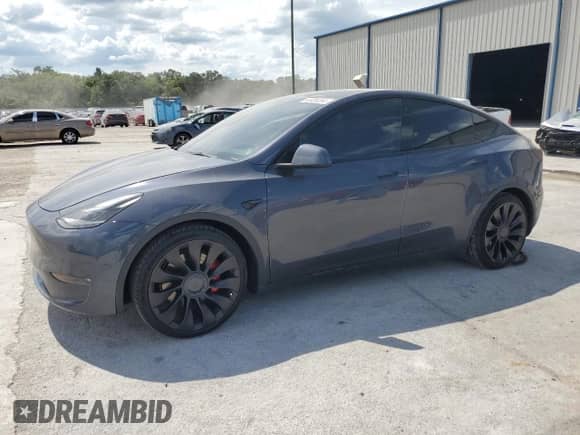 2022 Tesla Model Y Performance with VIN 7SAYGDEF9NF460112, listed as a Copart auction lot 60408264 with 22,186 mi miles and Salvage title. Bid and sale history available at DreamBid. Image 1.